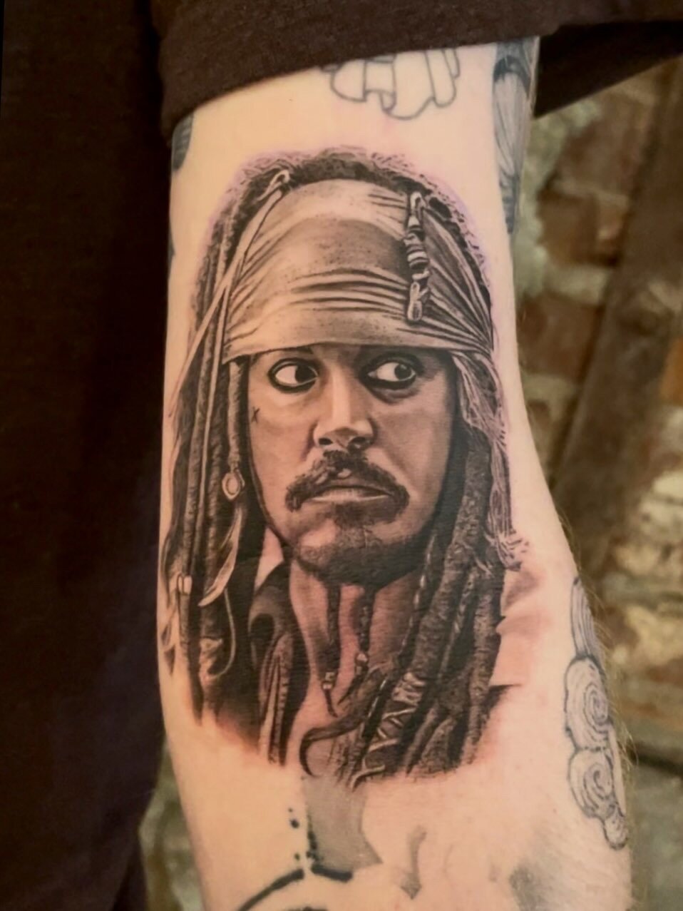 Custom black and grey realism tattoo by Carli Hall